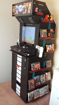 a video game stand in the corner of a room