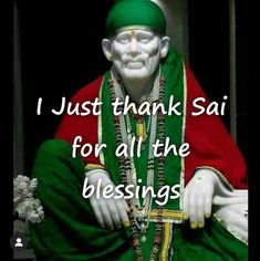 a statue with the words i just thank sai for all the blessings