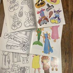 four sheets of children's coloring paper with cartoon characters on them, all in different shapes and sizes