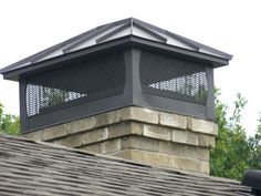 a brick chimney on top of a roof