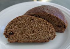 two slices of bread on a white plate