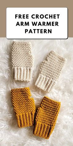 two knitted mittens sitting on top of a white furnishing covered floor