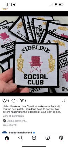 someone is holding up their social club patches