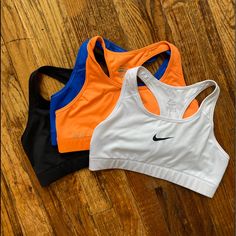 Nike Sports Bras, All Size M, Never Worn. Own Way Too Many Of These. Please Buy All 4! Supportive Nike Sports Bra, Nike Fitted Activewear With Built-in Padding, Nike Fitted Sports Bra For Running, Nike Fitted Running Sports Bra, Nike Fitted Sports Activewear, Nike Sporty Fitted Sports Bra, Nike Fitted Activewear For Sports, Sporty Supportive Tops For Sports, Nike Fitted Racerback Sports Bra