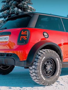 an suv is parked in the snow near some evergreens and pine trees with bright red paint