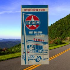 a sign on the side of a road that says derby best bargain drive and derby