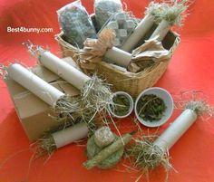 a basket filled with lots of different types of items on top of a red table