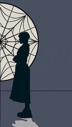 the silhouette of a woman standing in front of an umbrella