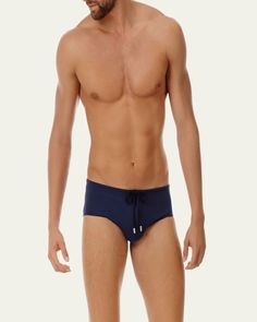 Vilebrequin swim briefs in comfortable, quickdrying fabric. Drawstring waist. Shaped front cut. Full seat coverage. Pullon style. Nylon/spandex. Imported. Navy Nylon Swimwear For Swimming, Beachwear Swim Trunks For Sports, Sporty Moisture-wicking Swim Trunks Brief, Nylon Swim Trunks Briefs, Sporty Tie-side Swim Trunks For Swimming, Fitted Nylon Brief Swim Trunks, Fitted Tie-side Bottoms For Water Sports, Sports Swim Trunks Brief With Stretch, Sporty Stretch Swim Trunks For Water Polo