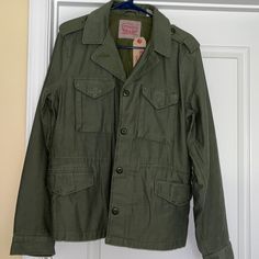 Brand New Cargo Jacket Size: X-Large 100 Percent Cotton Green Utility Outerwear With Pockets, Levi's Khaki Outerwear With Pockets, Levi's Casual Khaki Outerwear, Levi's Khaki Casual Outerwear, Green Cotton Outerwear With Cargo Pockets, Casual Long Sleeve Sport Coat With Flap Pockets, Military Green Outerwear With Side Pockets, Levi's Urban Cotton Outerwear, Military Style Green Outerwear With Side Pockets