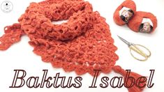 an orange crochet scarf with scissors and yarn on it that says baktus i sabel