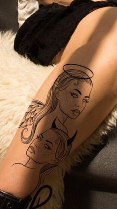 a woman's leg with a drawing of two women on it and the word love written