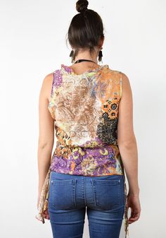 Floral asymmetrical blouse In great condition Tag: Labod Material: 68% cotton, 32% silk Size: Eu 42, medium, large bust 41 cm = 16 in length 56 cm = 22 in waist 40 cm =15,5 in Thank you for your visit! View more products: https://www.etsy.com/shop/VintageSeventhHeaven Feel free to contact me if you have any questions. Sleeveless Brown Cotton Blouse, Brown Sleeveless Cotton Blouse, Sleeveless Purple Cotton Blouse, Purple Cotton Sleeveless Blouse, Fitted Multicolor Asymmetrical Top, Purple Sleeveless Bohemian Tops, Brown Asymmetrical Summer Top, Sleeveless Orange Cotton Blouse, Linen Camisole