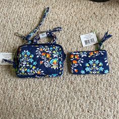 You Get 2 Brand New Pieces With Tags. One Is A “On The Square Wristlet”. It Comes With Both A Wristlet Strap And A Crossbody Strap. The Other Piece You Get Is A Coin Purse. Color Is Navy With White, Yellow, Orange And Light Blue Flowers. Orange And Light Blue, Light Blue Flowers, The Square, Vera Bradley Bags, Yellow Orange, Crossbody Strap, Vera Bradley, Blue Flowers, Coin Purse