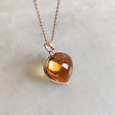 This stunning heart shape pendant is set in 14k Solid Yellow Gold with Natural Citrine with utmost precision. It is an unique gemstone pendant for nearly every occasion and is completely hassle-free jewelry. 🔷ABOUT GEMSTONE: Citrine, with its vibrant golden-yellow hues, is a gem of joy and abundance, radiating the warmth and energy of the sun. This captivating stone embodies qualities of positivity, success, and prosperity, believed to infuse one's life with a sunny disposition and enthusiasm. Elegant Amber Jewelry For Valentine's Day, Elegant Orange Heart-shaped Jewelry, Sunny Disposition, Heart Pendent, November Month, Yellow Hues, Handmade Jewelry Box, Citrine Jewelry, Pendant Heart