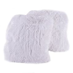 two white sheepskins on a white background