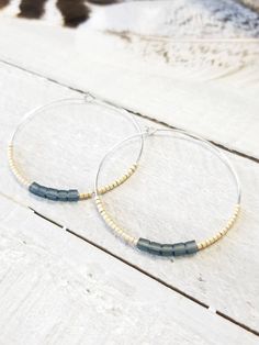 Champagne and matte Montana Blue cube seed beads. 1 ³/⁴ inches in diameter. Nickel free hoops. Choose gold or silver hoops. Return to shop 👇 https://www.etsy.com/shop/AxeandSparrow PLEASE MAKE SURE YOUR ADDRESS IS ENTERED CORRECTLY. IF YOU ARE DOING A GUEST CHECKOUT PLEASE PLEASE DOUBLE CHECK YOUR ADDRESS AND YOUR EMAIL. THANK YOU! *All feathers are cruelty free. All hooks are lead and nickel free. All leather is genuine leather. *Please feel free to contact me with ANY questions or custom crea Earrings Western, Earrings Beaded, Beaded Hoops, Seed Bead Earrings, Earrings Boho, Bead Earrings, Silver Hoops, Boho Earrings, Seed Bead