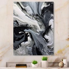 black and white abstract painting on the wall