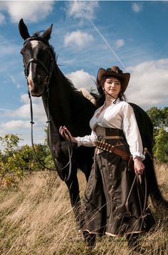 from the Prior Attire Steampunk Amazones collection - , Australian influence, Outback amazone. cotton blouse, wool and leather corset, .. wool riding skirt/trousers...re pics here:https://www.facebook.com/media/set/?set=a.494999160596328.1073741830.359653147464264=1 Cowboy Attire, Riding Skirt, Skirt Trousers, Plain People, Cowboy Costume, Steampunk Corset