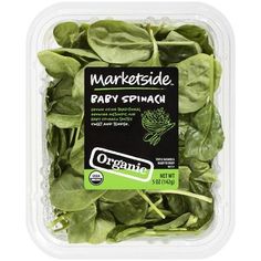 green leafy vegetables in a plastic container