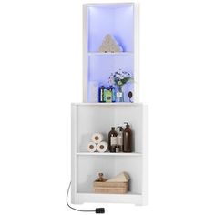 a white shelf with some items on it