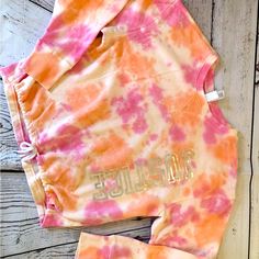 New Justice Tie Dyed Sweatshirt Sporty Soft-washed Pink Tops, Pink Hand Dyed Cotton Top, Pink Sweatshirt For Loungewear, Pink Bleached Crew Neck Top, Casual Pink Bleached Tops, Casual Hand Dyed Pink Tops, Casual Pink Hand Dyed Tops, Spring Pink Bleached Top, Bleached Pink Cotton Top