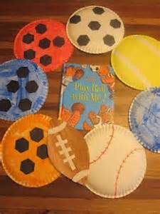 paper plates with different designs on them sitting on top of a wooden table next to a book