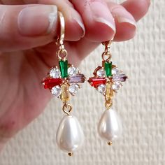 Here are pretty multi-color zirconium oxide earrings in medieval fashion. the large white pearl is iridescent glass. They measure 5 centimeters (50mm) and are very light to wear. The sleepers are made of copper with an 18k gold plating. DELIVERY : I send the jewelry by carefully packaged postal letter with a TRACKED NUMBER for France and internationally. If you have any questions, please do not hesitate to contact me. I wish you a good visit. Jeweled Metal Clip-on Earrings As Gift, Jeweled Dangle Bridal Earrings Gift, Elegant Multicolor Pearl Drop Earrings, White Jeweled Bridal Earrings Gift, Jeweled Dangle Pearl Earrings Gift, Jeweled Dangle Clip-on Earrings Gift, Elegant Multicolor Dangle Pearl Earrings, Multicolor Pearl Drop Earrings, Multicolor Pearl Drop Earrings For Gift