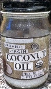 an open jar of coconut oil sitting on top of a counter