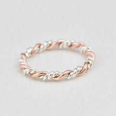 🌌 BEAUTIFUL BRAIDED PATTERN RING 🌌 Double braided pattern design in the dual-tone makes it a great unifying piece when wearing gold and silver together. We also have this ring available in Silver/Silver, Silver/Yellow Gold Filled, Silver/10K Rose and Silver/10K Yellow in the drop-down menu. The 10K gold options are made with genuine 10K gold and silver twisted. It will arrive in a silver gift box, ready for giving or keeping. D E T A I L S * Functions: stackable, solitary, thumb or midi ring t Gold Twist Ring, Stacked Rings, Wire Jewelry Rings, Twisted Ring, Bijoux Fil Aluminium, Stacker Rings, Black Gold Jewelry, Braided Ring, Stack Ring