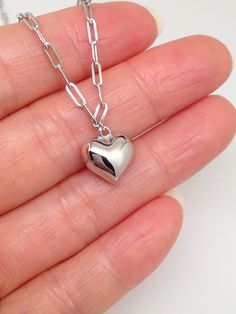 925 Sterling Silver 3D Puffed Heart Pendant Necklace - Metal: 925 Sterling Silver (Finish: Rhodium Plated) - Shape: Puffed Heart (pendant is fixed on chain, can't move) - Pendant Dimension: Height 9mm(0.35 in) x Width 10mm(0.39 in) x Thickness 6mm(0.24 in) - Paperclip Link Chain: 18" Adjustable (16" + 1" + 1"), Lobster Clasp.  (Paperclip link 5mm x 1.9mm) - Color: Silver Heart Paperclip, Paperclip Chain Necklace, 3d Heart, Puffed Heart, Silver Heart Necklace, Small Heart, Fine Jewellery Necklace, Metal Necklaces, Chain Link Necklace