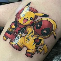 a cartoon character tattoo on the leg of a woman's thigh, with pikachu and eebi