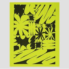 a black and yellow print with flowers on it's side, in the middle of an abstract pattern