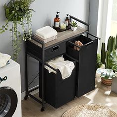 a washer and dryer sitting next to each other in a room