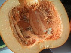 the inside of a pumpkin is cut open and ready to be eaten