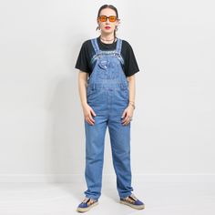 "Vintage denim overalls in blue - adjustable suspenders - two rows of buttons for adjusting the waist circumference - 5 pockets - materials: 100% cotton Size from the tag: M MEASUREMENTS bust: open waist: 38.5-45 inches (98-114 cm)  hips: 40 inches (102 cm) inseam: 30.5 inches (77 cm) The model is 5'9\" (174 cm), measures 35-27-38 (89-69-96 cm) and typically wears clothing in size M CONDITION - 8/10 - The overalls in good pre-owned vintage condition. Washed, ready to wear." Dark Wash Denim Overall Jumpsuit With Suspenders, Dark Wash Denim Jumpsuit With Suspenders, Denim Jumpsuit With Suspenders, Dark Wash Overalls With Suspenders, Casual Blue Overalls With Suspenders, Denim Overalls With Suspenders In Blue, Blue Denim Jumpsuit With Suspenders, Denim Blue Jeans Overalls With Suspenders, Blue Shortalls With Suspenders