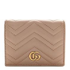 This is an authentic GUCCI Calfskin Matelasse GG Marmont Card Case Wallet in Porcelain Rose. This stylish cardholder is crafted of calfskin leather in beige pink featuring chevron style stitching and an aged gold GG on front. This wallet has card slots, zipper pocket and a bill compartment. Brown Gucci Wallets With Interior Card Slots, Gucci Brown Wallets With Interior Card Slots, Designer Compact Leather Coin Purse, Designer Beige Leather Wallets, Luxury Soft Leather Brown Wallets, Luxury Brown Soft Leather Wallet, Gucci Brown Formal Wallet, Formal Brown Gucci Wallet, Gucci Brown Wallet With Card Slots