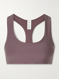 This 'Advantage' sports bra is made from Alo Yoga's 'Airlift' fabric which provides light support for low-impact classes. It has removable cups and is cut for a "second-skin" fit with racerback straps, so it won't restrict you during a vinyasa flow. Wear yours with a pair of the brand's high-rise leggings. Winter Work Wear, Yoga Store, Vinyasa Flow, Xmas List, Yoga Sports Bra, Racerback Sports Bra, Pink Sports Bra, High Rise Leggings, Black Sports Bra