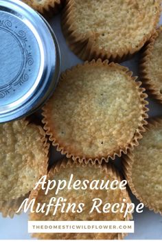 some muffins are sitting next to a can