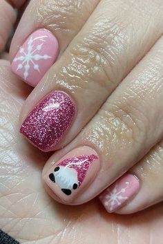 It can be anything, as long as it's holiday-themed! Gel Nail Holiday Designs, Christmas Gnome Nail Ideas, Christmas Nails Short Neutral, Pink Gold Christmas Nails, Xmas Gonk Nails, Pink Gonk Nails, Nails Design November, Birthday And Christmas Nails, Untraditional Christmas Nails