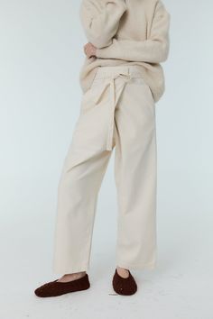 Our special Tokyo pant with a wide leg and herringbone twill, crossing over and fastening with a belt in the same fabric. 100% Cotton. Cream Pants Outfit, Kids Garments, Cream Pants, Shoe Inspiration, Pants White, Active Wear Leggings, Sweaters Knitwear, Skirted Swimwear, Cotton Pants