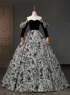 Dreaming of making a grand, artistic statement on your prom night? Don this monochromatic masterpiece, a dress that marries the drama of black velvet with the classic finesse of a white floral skirt. The off-shoulder velvet bodice is a tribute to the night, while the skirt bursts into the scene with botanical illustrations reminiscent of vintage etchings. The puffed sleeves with matching floral adornments are a nod to a bygone era of decadence. This gown doesn't just make an entrancet commands the scene, a perfect choice for the prom-goer who is both a lover of art and a muse. 2023 Ball Gown, Long Sleeve Quinceanera Dresses, Quinceanera Dresses Black, Backless Prom Dress, Black Ball Gown, White Floral Skirt, Dark Green Dress, Quinceanera Dress, Vintage Silhouette