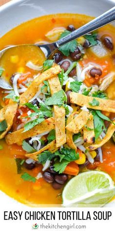 easy chicken tortilla soup in a bowl with cilantro and black beans