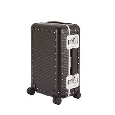 a black suitcase with silver studded handles