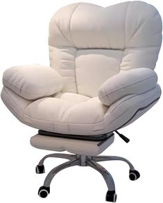 a white leather chair and ottoman with wheels