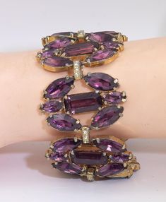 JD10724 This Juliana's bracelet is 7" x 1 ¼" wide and is a showstopper!! If you wear it you would believe that these are all real stones made by a great jeweler. This vintage Juliana bracelet is in excellent condition. Mid Century Jewelry, Amethyst Jewelry, Pretty Bracelets, Rhinestone Bracelet, Vintage Costume Jewelry, Vintage Costumes, Chain Link Bracelet, Link Bracelets, Chain Link