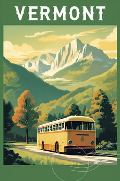 a yellow bus driving down a road next to mountains