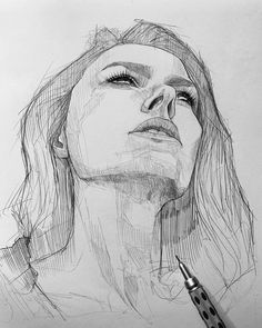 a pencil drawing of a woman's face with her head tilted to the side