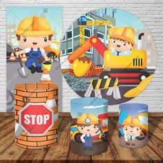 children's construction themed mugs on a wooden table