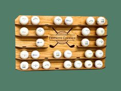 a wooden rack with several golf balls on it and the words'favorite courses '